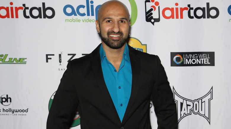 Shawn Daivari smiling at event