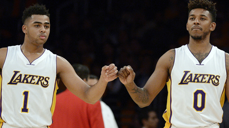 D'Angelo Russell and Nick Young touching fists