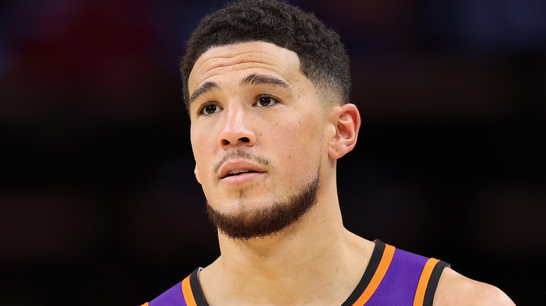 Devin Booker wearing purple