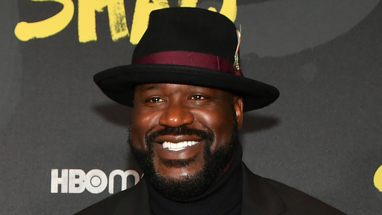 Shaquille O'Neal wearing a hat