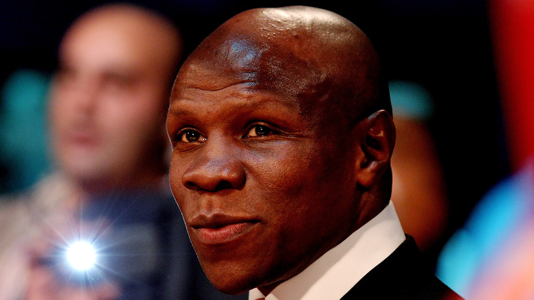 Chris Eubank wearing a suit