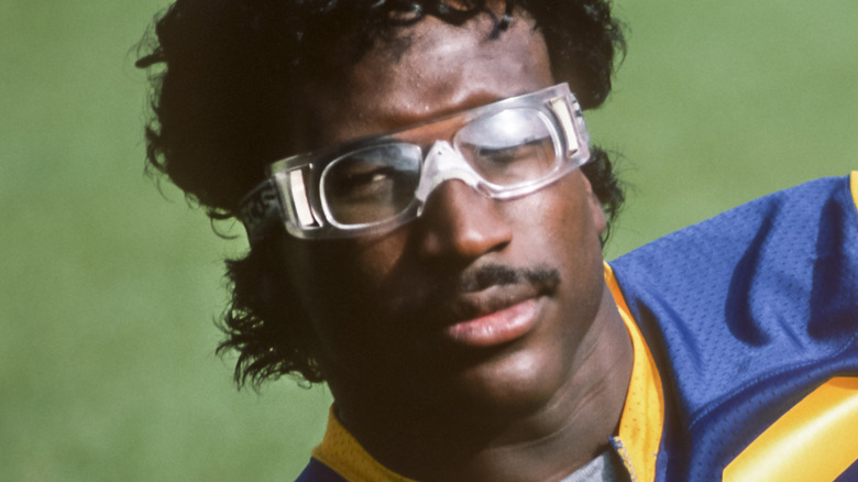 Erik Dickerson wearing glasses