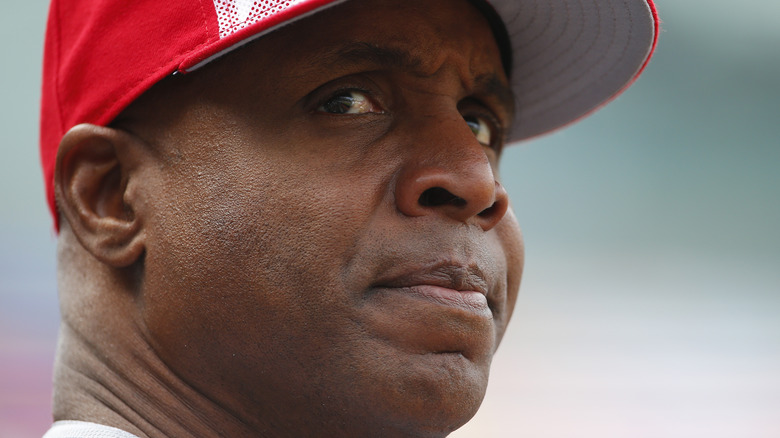 Barry Bonds in red hat, frowning