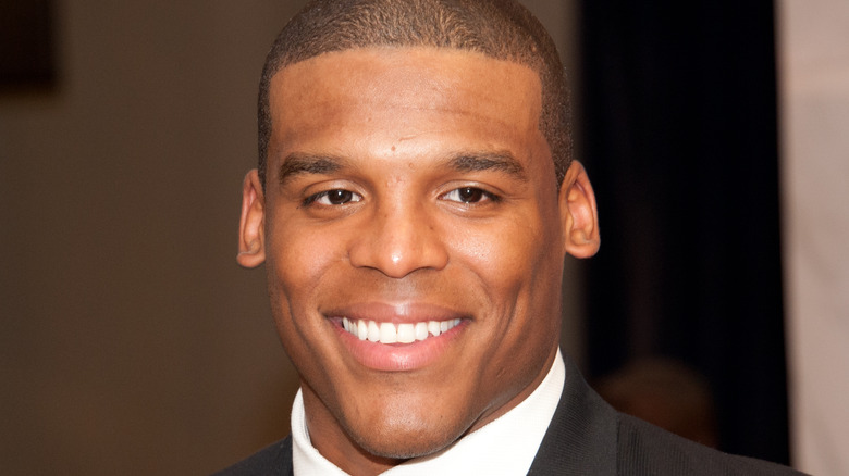 Cam Newton in suit