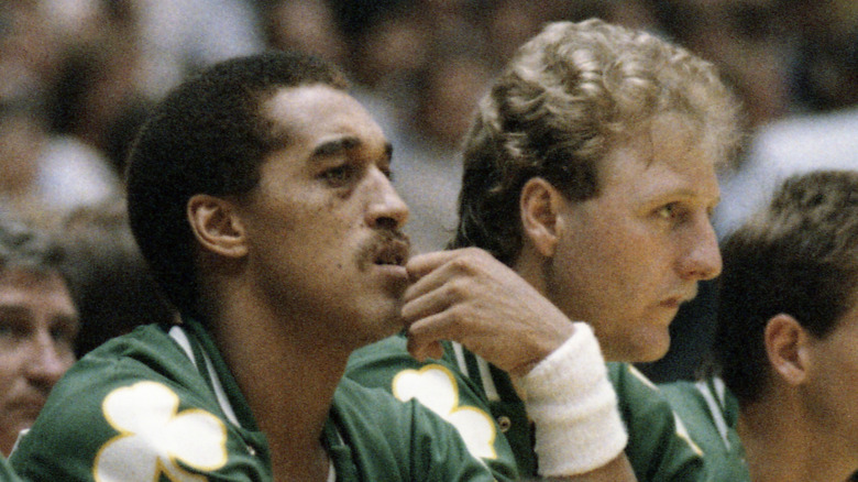 Dennis Johnson, left, and Larry Bird, right