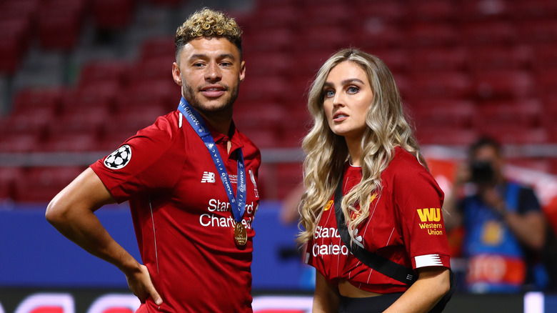 Alex Oxlade-Chamberlain and Perrie Edwards in LFC jerseys