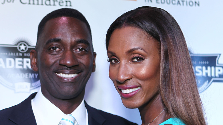 Lisa Leslie with her hand on Michael Lockwood