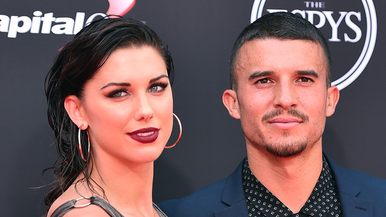 Alex Morgan and Servando Carrasco smiling