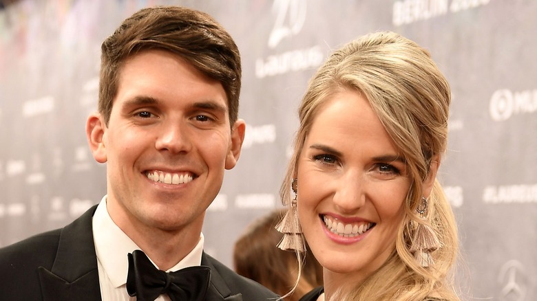 Missy Franklin with her hand on Hayes Johnson