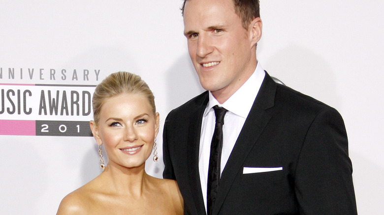 Dion Phaneuf and Elisha Cuthbert, smiling