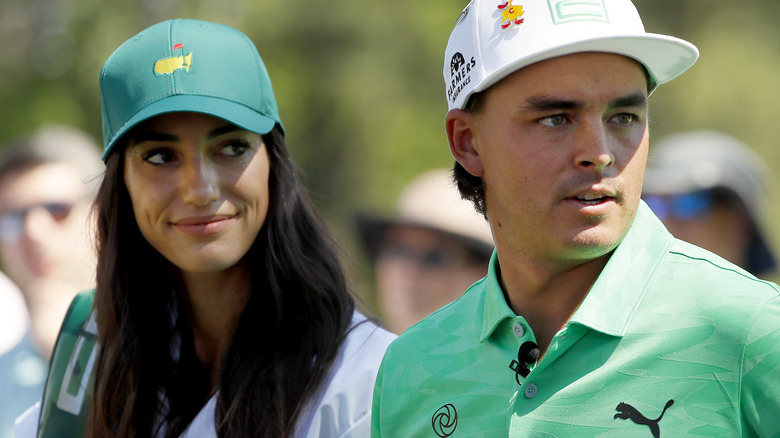 Rickie Fowler and Allison Stokkein, smiling