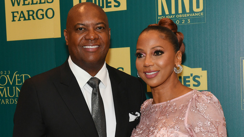 Rodney Peete and Holly Robinson Peete smiling in 2023