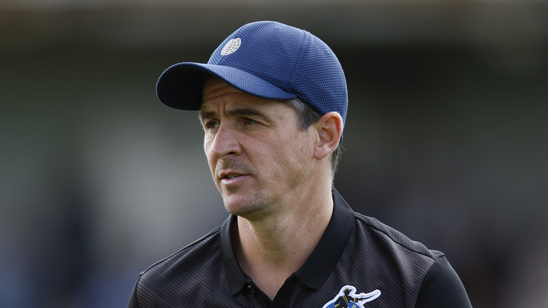 Joey Barton wearing hat