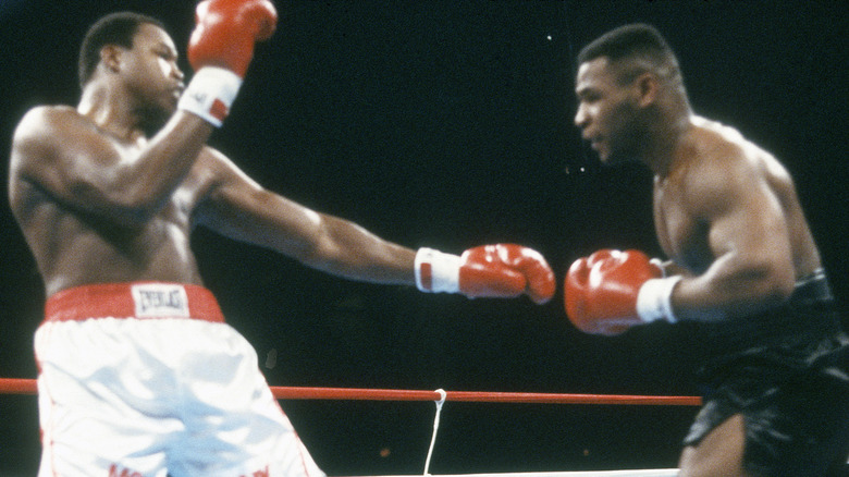 Larry Holmes and Mike Tyson boxing 