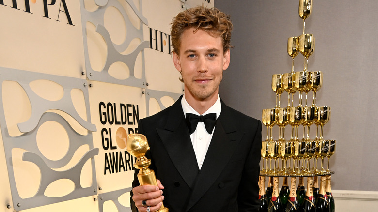 Austin Butler is pictured with his Golden Globe Award