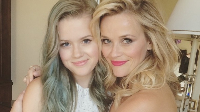 Reese Witherspoon hugging Ava Phillippe