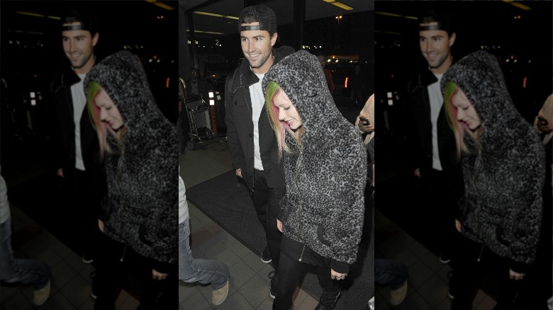 Avril Lavigne and Brody Jenner walk together