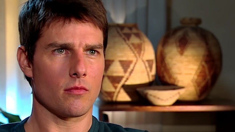 Tom Cruise frowning