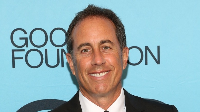 Jerry Seinfeld smiling at camera