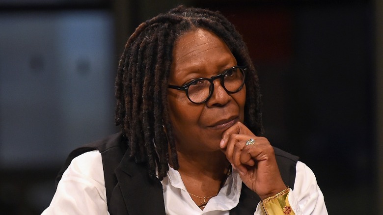 Whoopi Goldberg looking to side