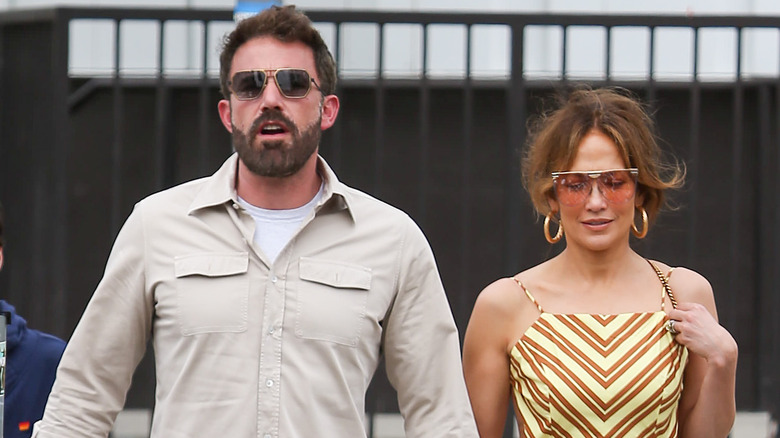 Ben Affleck and Jennifer Lopez walking down the street