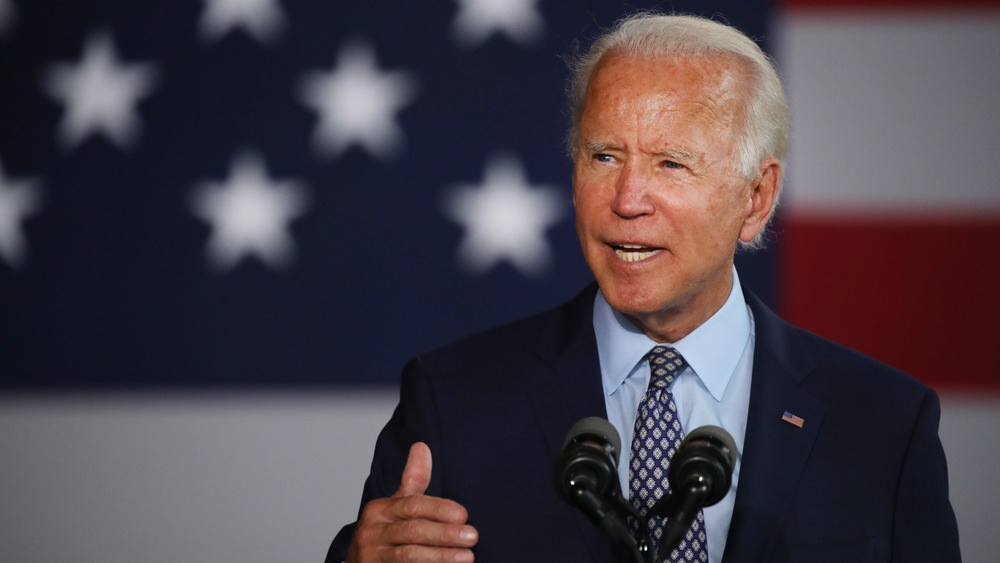 Joe Biden speaking while gesturing with his hands