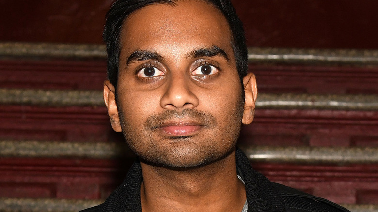 Aziz Ansari posing