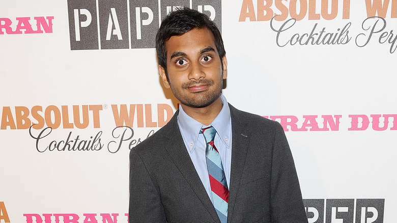 Aziz Ansari posing