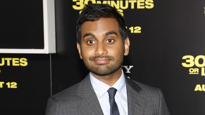 Aziz Ansari posing