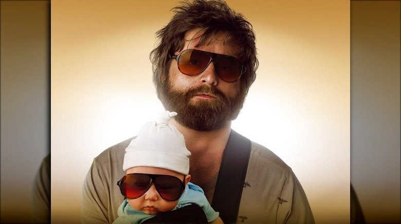 Alan, baby Carlos on The Hangover poster