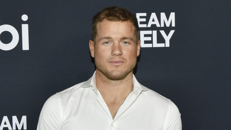 Colton Underwood poses on the red carpet 