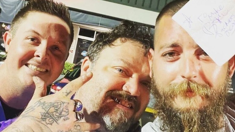 Bam Margera with fans outside tavern