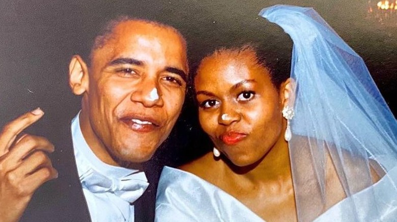 Barack and Michelle Obama smiling at their wedding