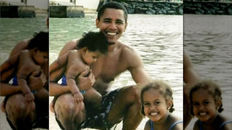 Barack Obama at the beach with his daughters