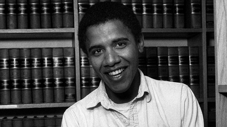 Barack Obama in front of books