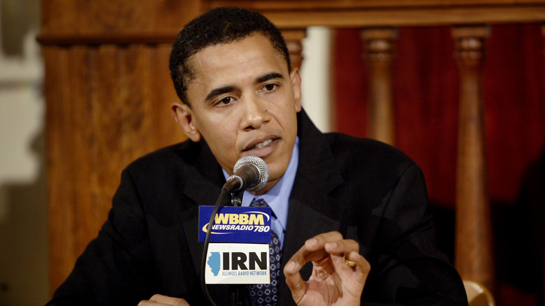 Barack Obama talking into a mic