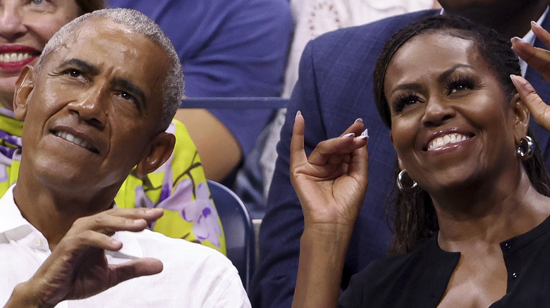 Barack and Michelle Obama looking up