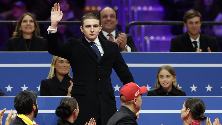 Barron Trump waving at the 2025 inauguration parade of Donald Trump