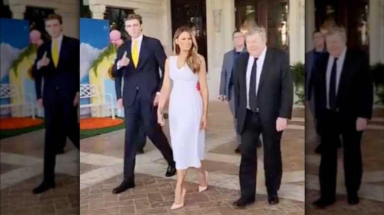 Barron Trump walking with mom Melania