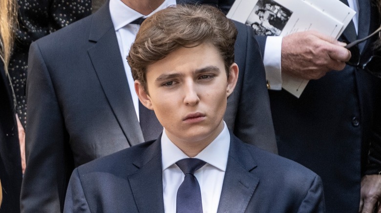 Barron Trump looks downcast