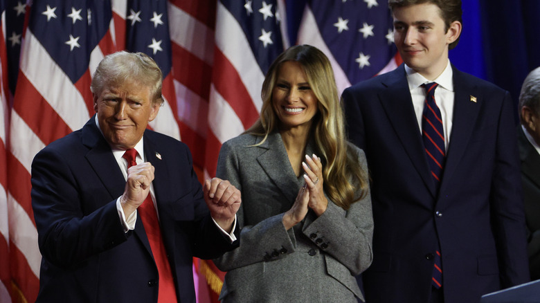 Donald Trump, Melania, and Barron Trump on stage