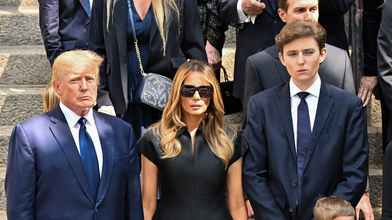 Donald Trump, Melania Trump, and Barron Trump at funeral