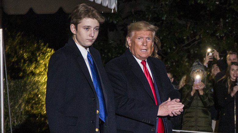 Barron Trump towers over both his parents