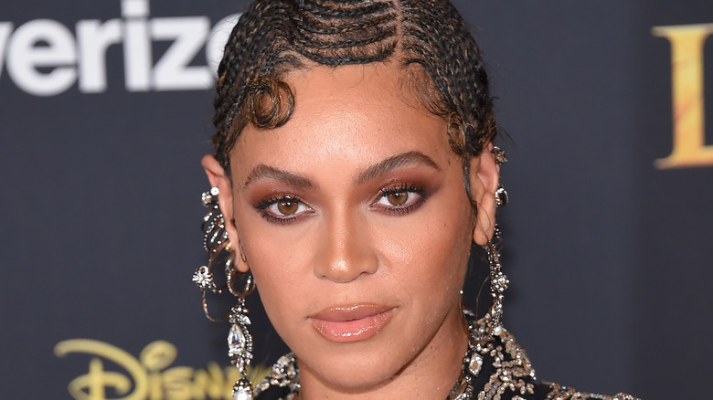 Beyonce with braids, posing