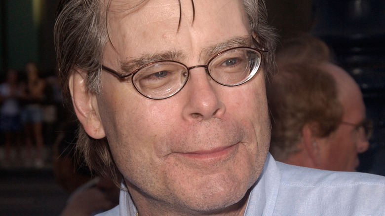 Stephen King wearing glasses and smiling