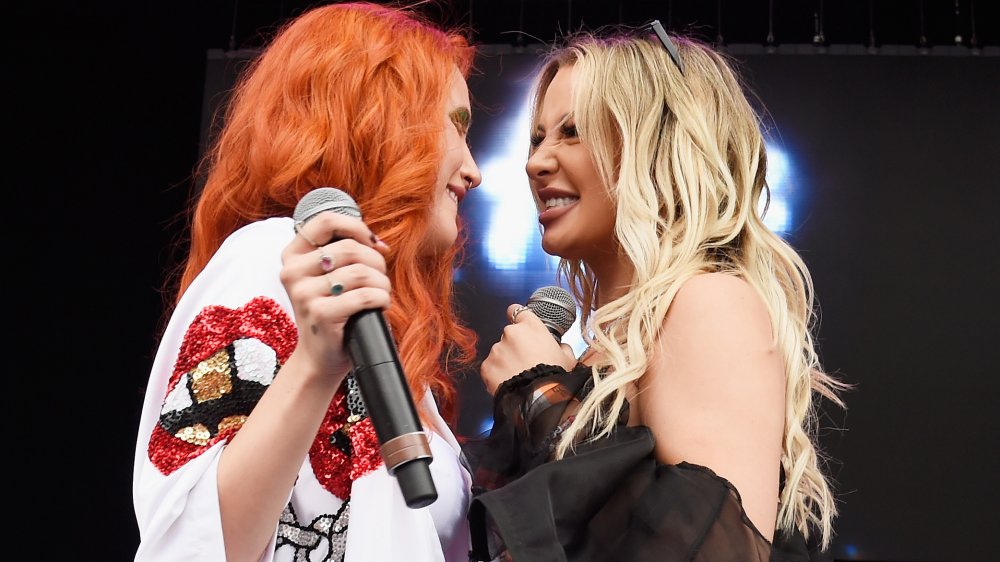 Bella Thorne and Tana Mongeau on stage