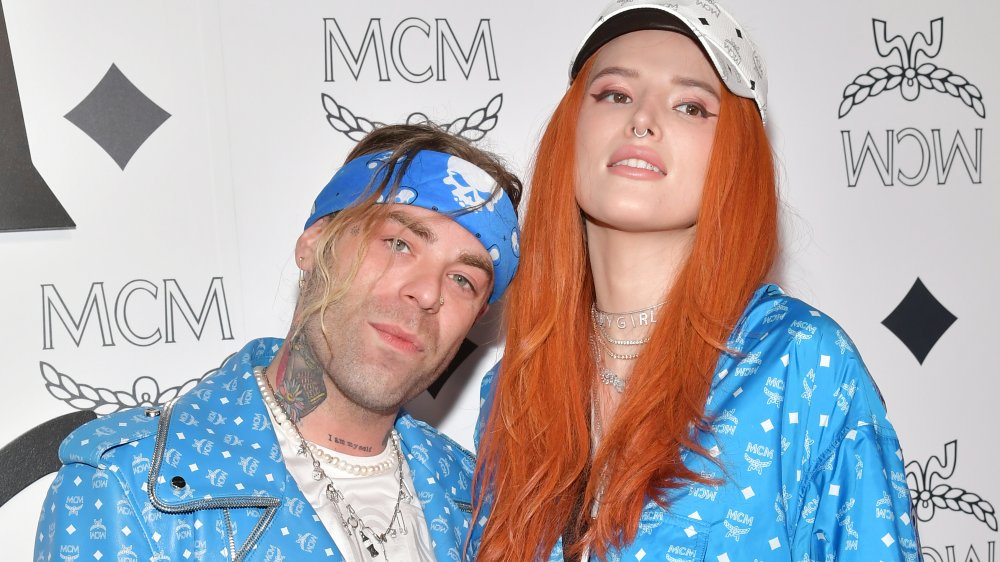 Mod Sun and Bella Thorne in matching MCM blue jackets