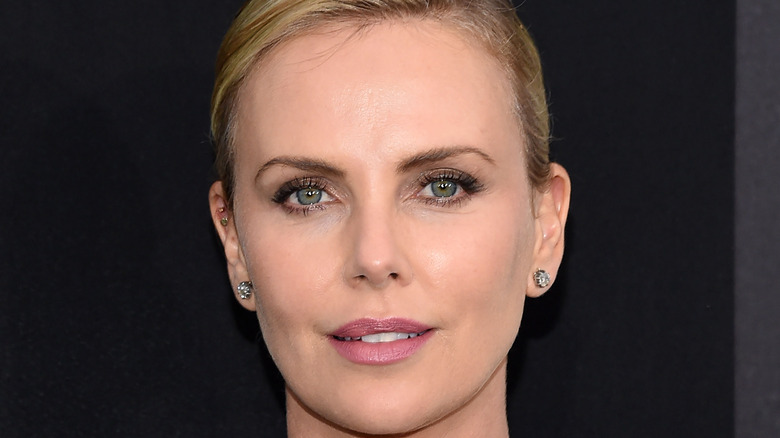 Charlize Theron looking at camera, Atomic Blonde premiere