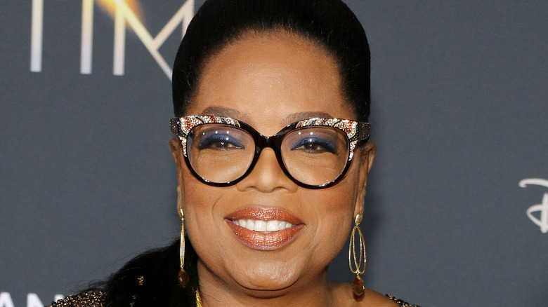 Oprah Winfrey smiling on the red carpet