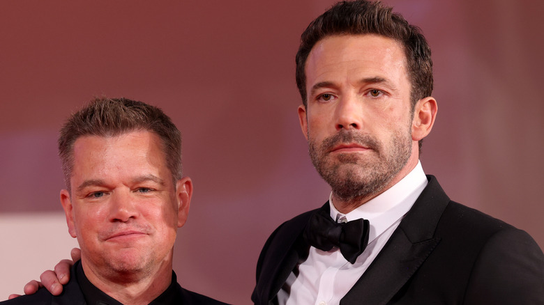 Matt Damon and Ben Affleck pose at "The Last Duel" premiere